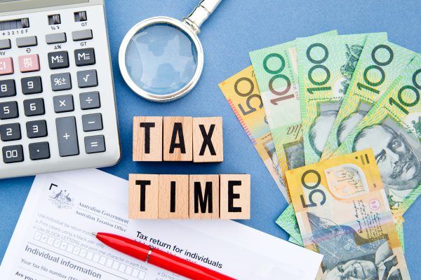 Tax,time, ,australia, ,wooden,letters,with,tax,form,